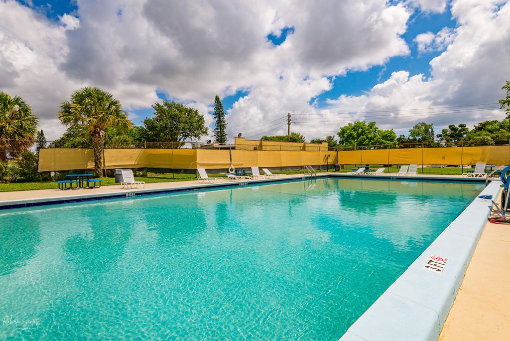 Photo of 9375 SW 61st Way SW #D, Boca Raton, FL 33428 (MLS # B26005123)