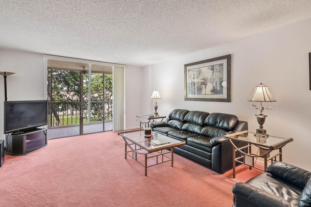 Photo of 4735 E Lucerne Lakes Blvd Blvd E #308, Lake Worth, FL 33467 (MLS # B26013074)