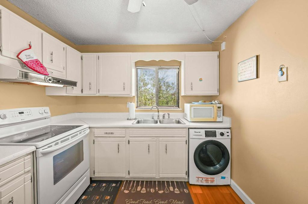 Photo of 1501 NE 13th Terrace #H16, Jensen Beach, FL 34957 (MLS # R11128924)