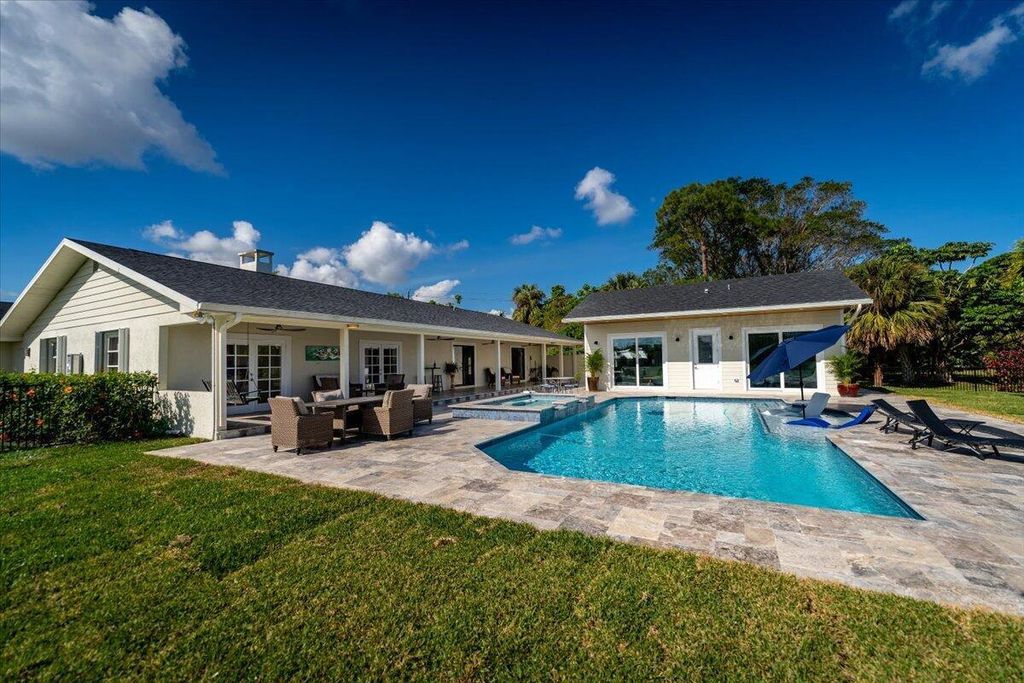 Photo of 724 NW Spruce Ridge Drive, Stuart, FL 34994 (MLS # R11080053)