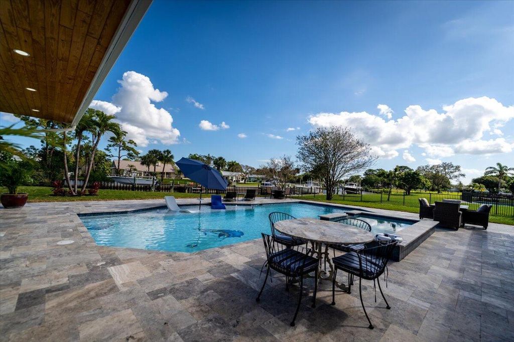 Photo of 724 NW Spruce Ridge Drive, Stuart, FL 34994 (MLS # R11080053)