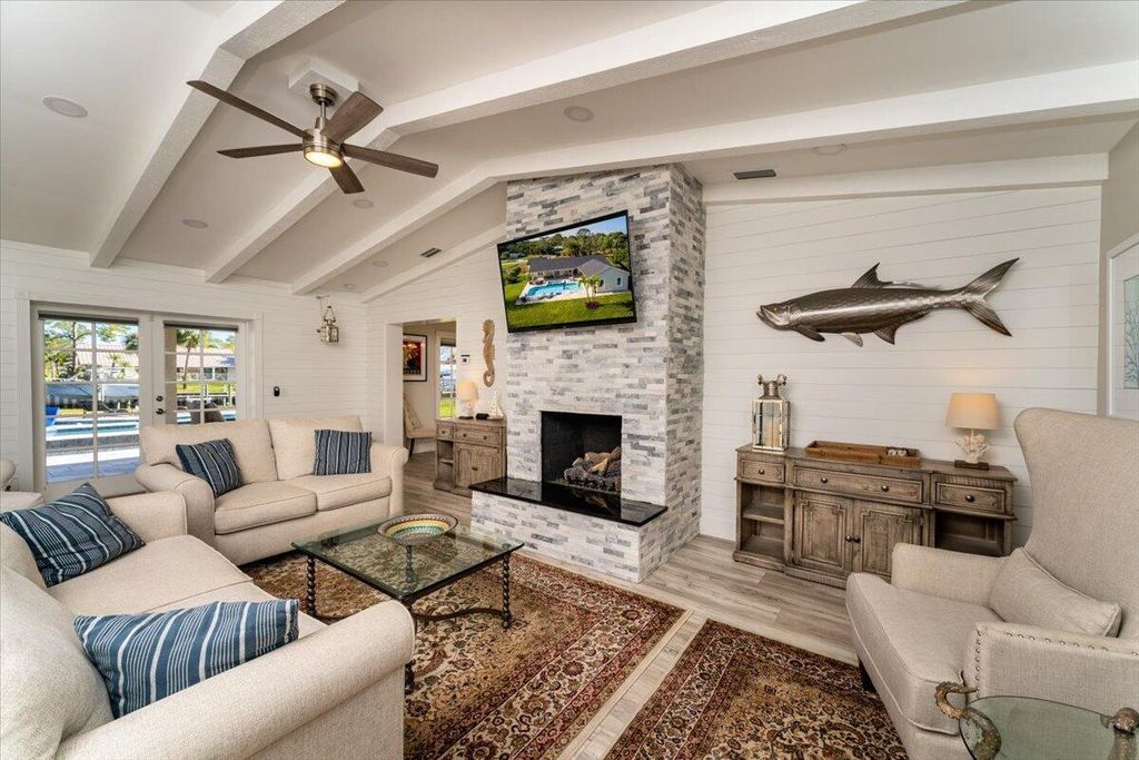 Photo of 724 NW Spruce Ridge Drive, Stuart, FL 34994 (MLS # R11080053)