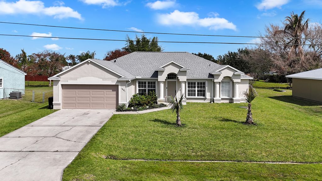 Photo of 1891 SE Mandrake Circle, Port Saint Lucie, FL 34952 (MLS # B26026085)
