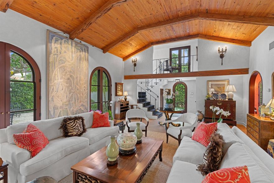 Winner of 2014 Polly Earl Award from the Preservation Foundation of Palm Beach, this rarely available single-family home designed by master architect Maurice Fatio in 1924, sits a half-block from the new Town Docks, on one of Palm Beach's most coveted mid-town streets. The property includes three private courtyards with coquina stone terraces, two fountains and a 10' x 25' heated pool. Meticulously and expertly restored, expanded and renovated, the house reflects a seamless combination of original details and modern conveniences, including the highest level of finishes, impact doors and windows.An arched entry foyer with powder room leads to a stunning living room with vaulted pecky cypress ceiling, original tile floors, and a gas fireplace with mantle fabricated by​​‌​​​​‌​‌​​​‌‌​​​‌‌‌​​‌​​‌‌​​​​ Herpel.