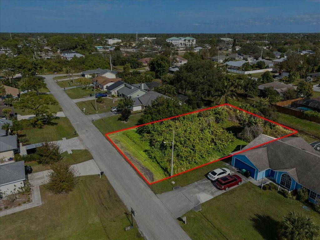 Photo of 2433 SW Hinchman Street, Port Saint Lucie, FL 34984 (MLS # R11053995)