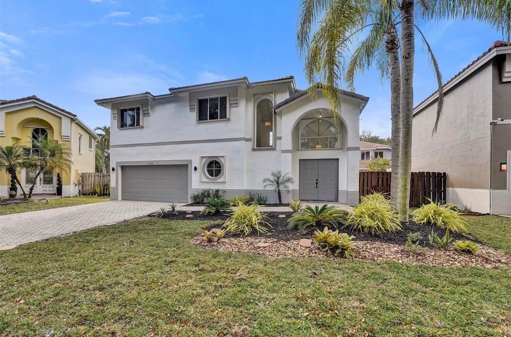 Photo of 11208 Rhapsody Road, Hollywood, FL 33026 (MLS # B26043541)
