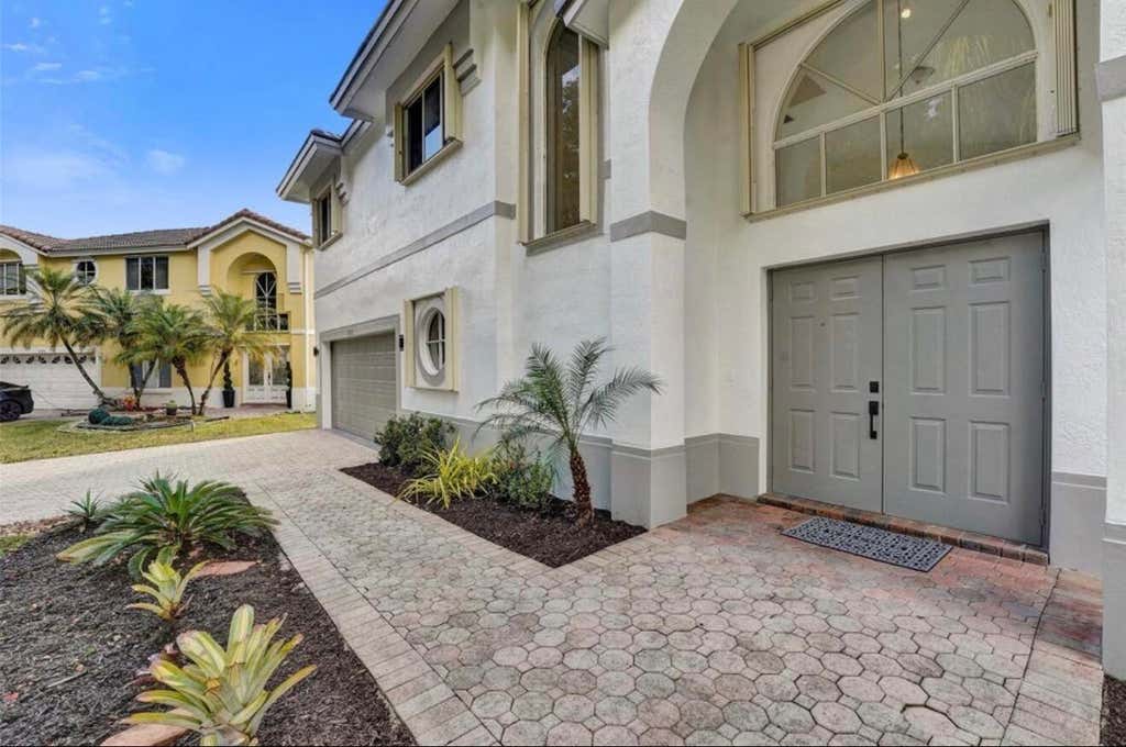 Photo of 11208 Rhapsody Road, Hollywood, FL 33026 (MLS # B26043541)