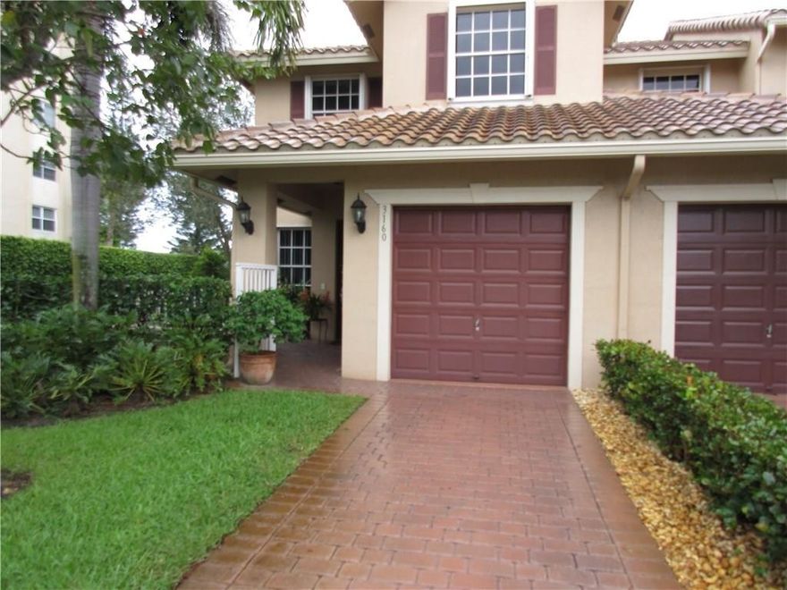 UPGRADED CORNER UNIT ON GRAND OAKS GOLF COURSE LOCATED IN HEART OF DAVIE CLOSE TO UNIVERSITIESFEATURING WOOD FLOORS THROUGHOUT,UPGRADED STAINLESS STEEL APPLIANCES,TILED REAR SCREENED PATIO AND PAVERED FRONT PATIO,CROWN MOLDING THROUGHOUT,CUSTOM PAINT,FAMILY ROOM,ACCORDION SHUTTERS,5 YEAR OLD UPGRADED A/C,THIS MODEL HOME QUALITY TOWNHOME IS A PLEASURE TO SHOW...LOTS OF NATURAL LIGHT , LOCATED IN A SOUGHT AFTER ,UPSCALE, BOUTIQUE COMMUNITY WITH POOL,CLOSE TO SHOPPING,AIRPORT AND 1-595