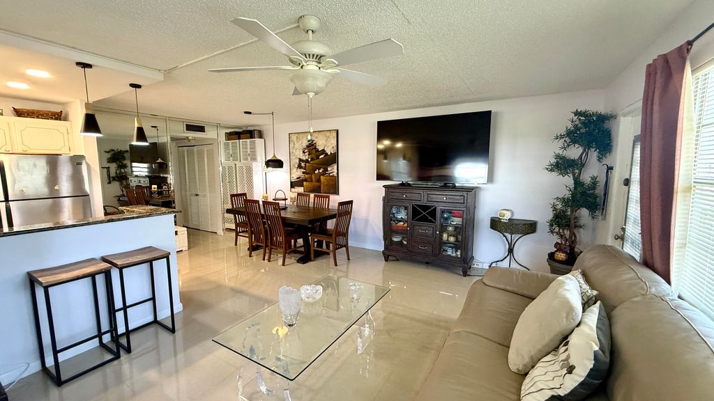 Photo of 21 Newport B Court, Deerfield Beach, FL 33442 (MLS # B26028341)