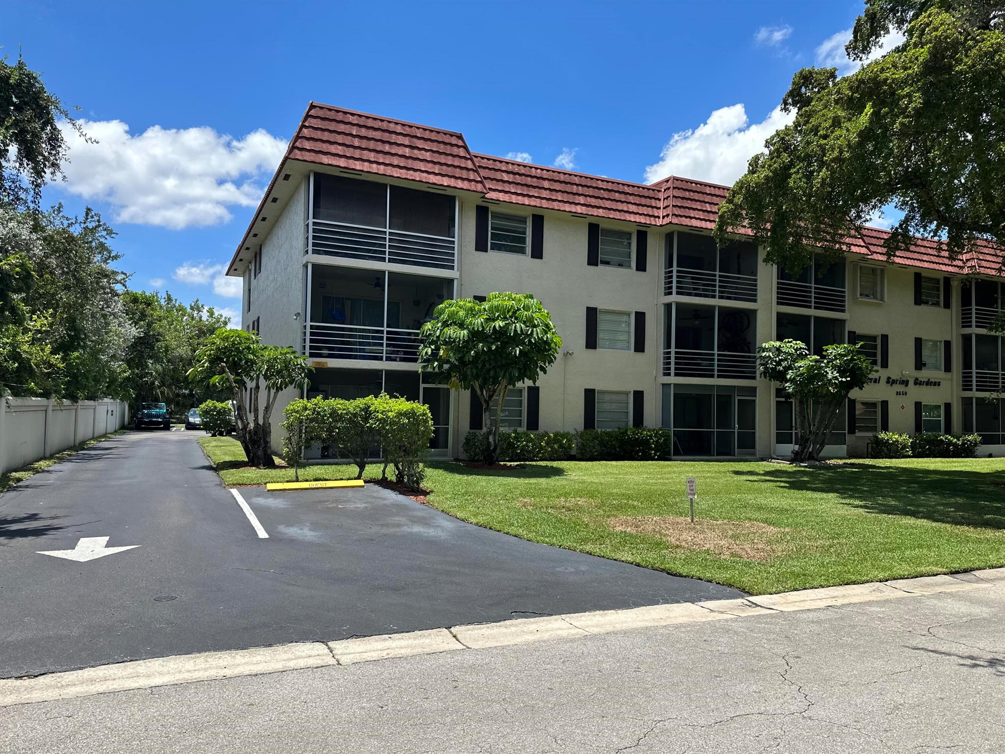 Beautiful ground floor unit in the heart of Coral Springs with parking right at your door. This spacious and open 2/2 unit has been totally remodeled and freshly painted, ceramic tile. The unit includes some updates, with a gorgeous kitchen boasting wood side cabinets, granite countertops, and stainless-steel appliances. The remodeled bathrooms offer plenty of closet space, LED lights, and ceiling fans. Additional features include new plumbing, a new electrical panel, hurricane shutters, and a screened-in patio with storage space. The community offers a pool, clubhouse, and laundry facilities. This is an all-ages community. Each unit has one assigned parking space with limited guest spots.