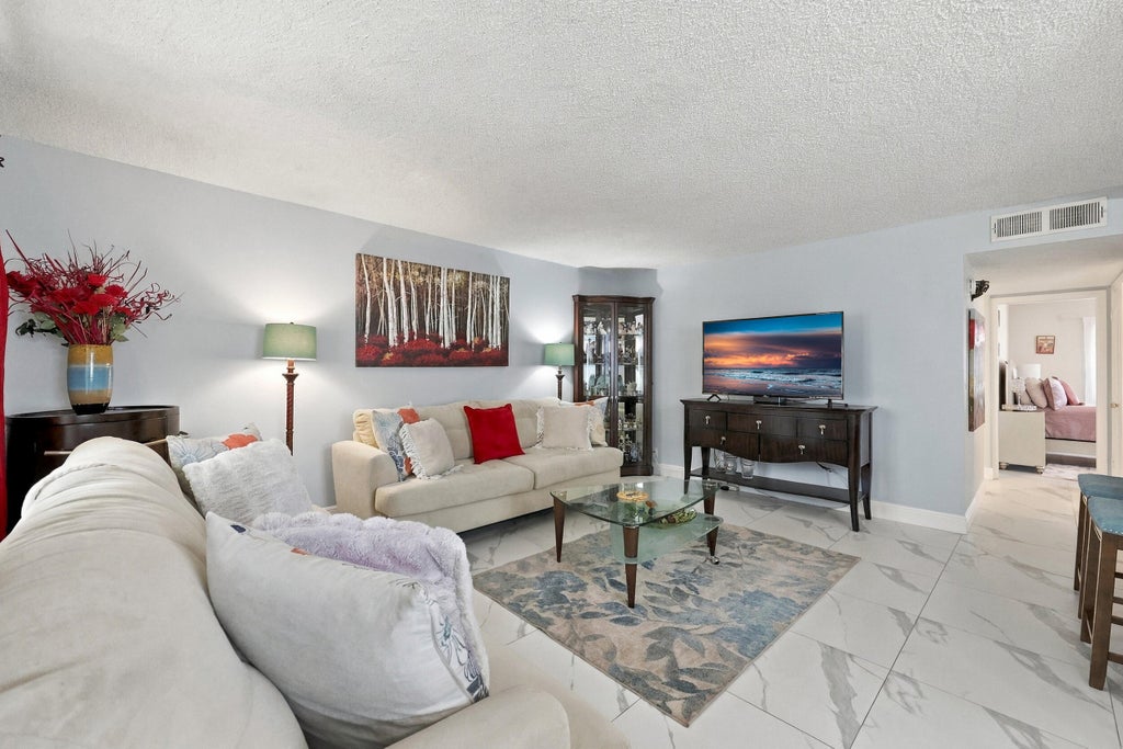 Photo of 579 NORMANDY M, Delray Beach, FL 33484 (MLS # B26079265)