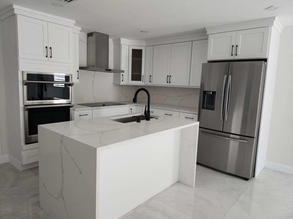 Photo of 2542 Carambola Road, West Palm Beach, FL 33406 (MLS # R10981182)