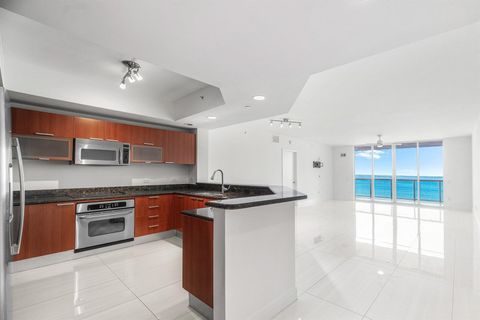 Photo of 2650 Lake Shore Drive #1005, Riviera Beach, FL 33404 (MLS # R11128761)