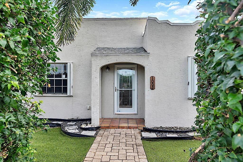 Photo of 1002 S J Street, Lake Worth Beach, FL 33460 (MLS # R11024598)