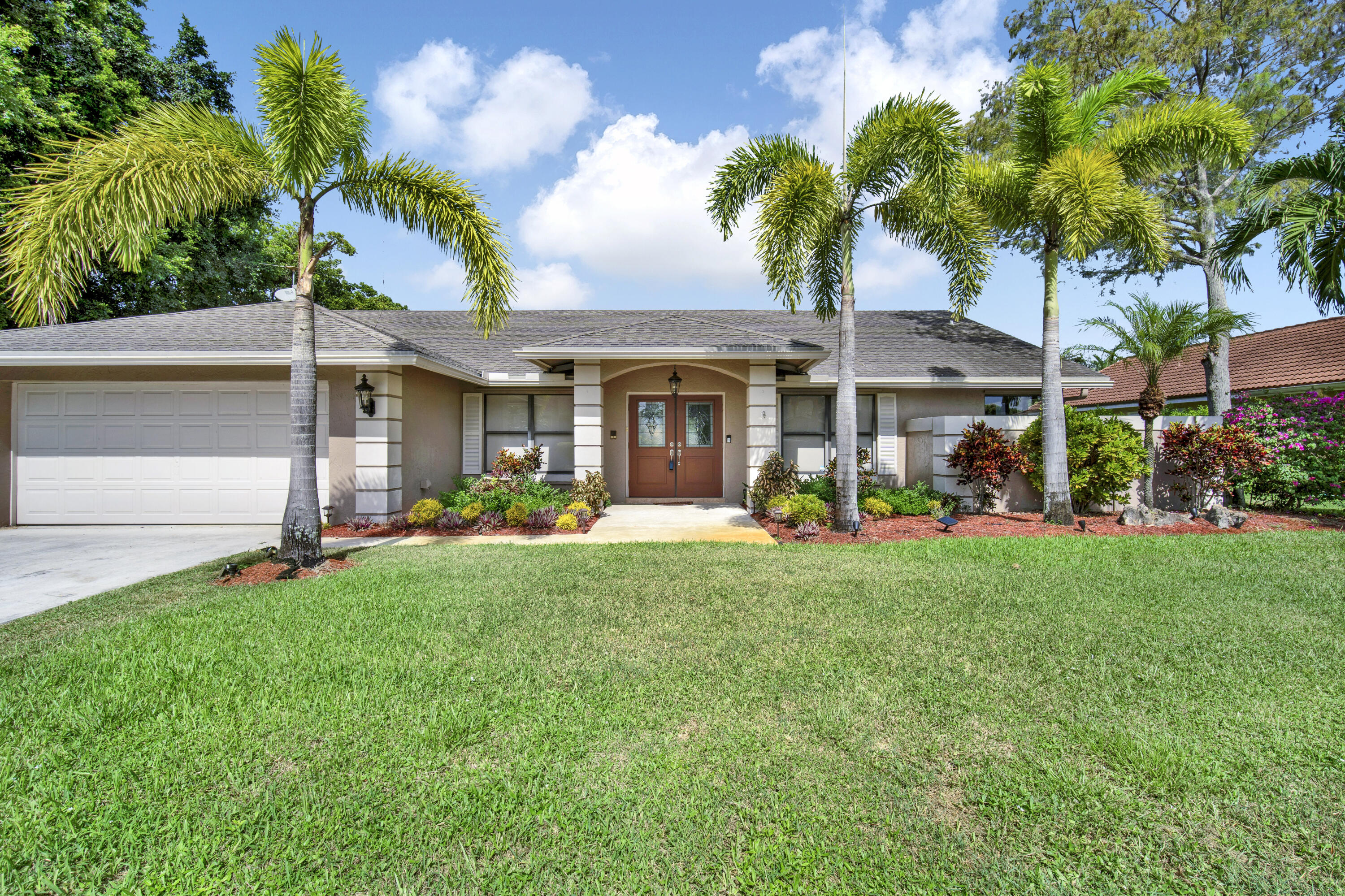 This fully furnished 4-bedroom, 2-bath pool home with 2,530 square feet of living space offers the perfect combination of comfort and convenience in Wellington's sought-after Chatsworth Village/Greenview Shores 2.Inside, you'll find open living and dining spaces with a welcoming flow. The primary bedroom has direct access to the screened pool and patio, creating a true retreat. A cabana bath with its own pool entrance makes outdoor living easy and practical.Relax by the private screened pool after a day of golf, polo, or exploring Wellington's charming shops and restaurants. The home is fully furnished with no detail spared, ready for snowbirds seeking a warm-weather getaway or tenants looking for an annual rental in a fantastic community.