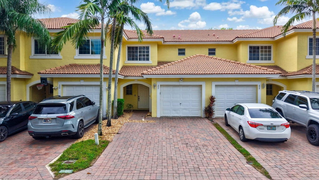 Photo of 660 Imperial Lake Road, West Palm Beach, FL 33413 (MLS # B26075598)
