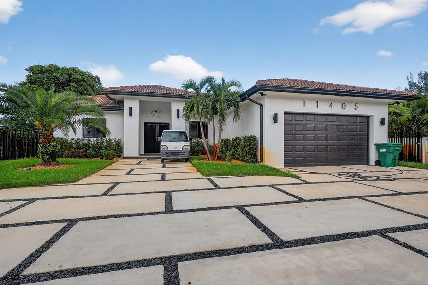 This stunning 4-bedroom, 3-bath single-family home offers 2,483 sq. ft. of living space behind a secure gated entry. Featuring a Mediterranean-style tile roof, lush palm landscaping, and a spacious driveway with 2-car garage, the home combines elegance and functionality. Enjoy modern finishes throughout and a private fenced yard ideal for outdoor gatherings. Conveniently located in a desirable neighborhood, this property blends privacy, style, and everyday comfort.