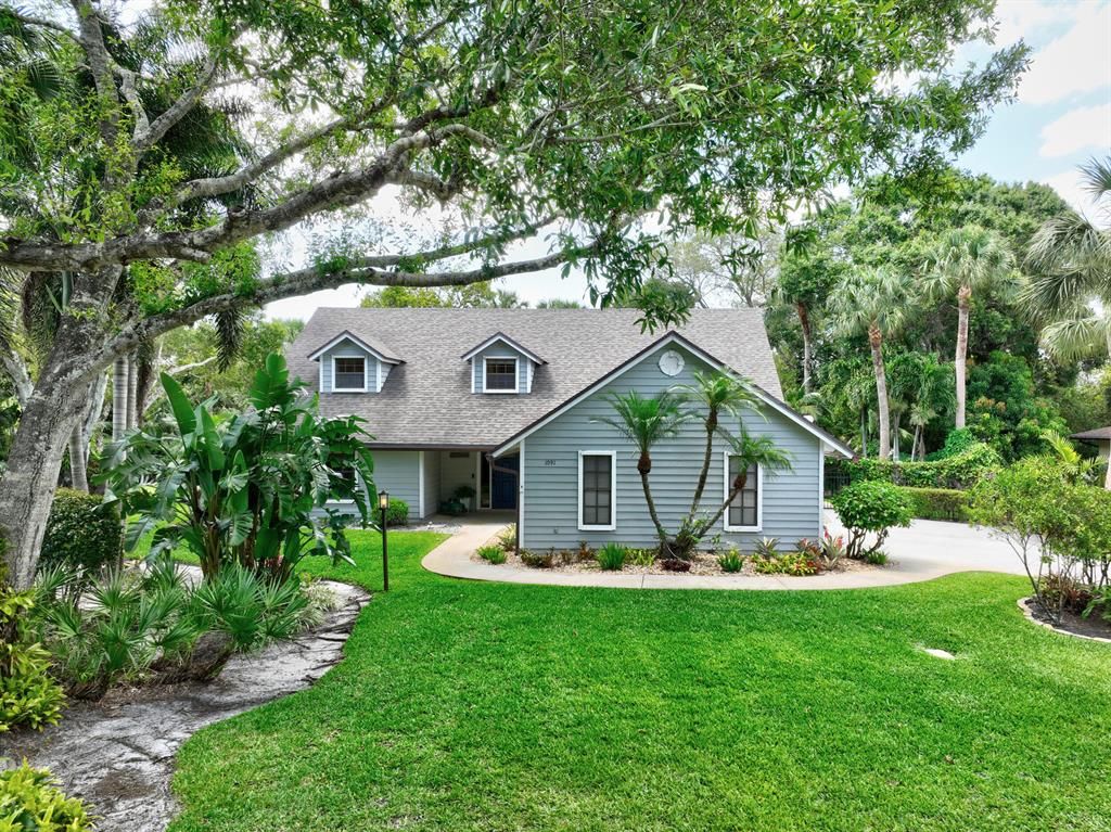 Photo of 1091 SE Buttonwood Circle, Stuart, FL 34997 (MLS # R10880616)