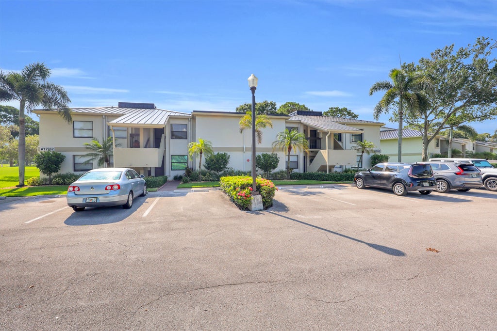 Photo of 12962 Briarlake Drive #202, West Palm Beach, FL 33418 (MLS # B26045410)
