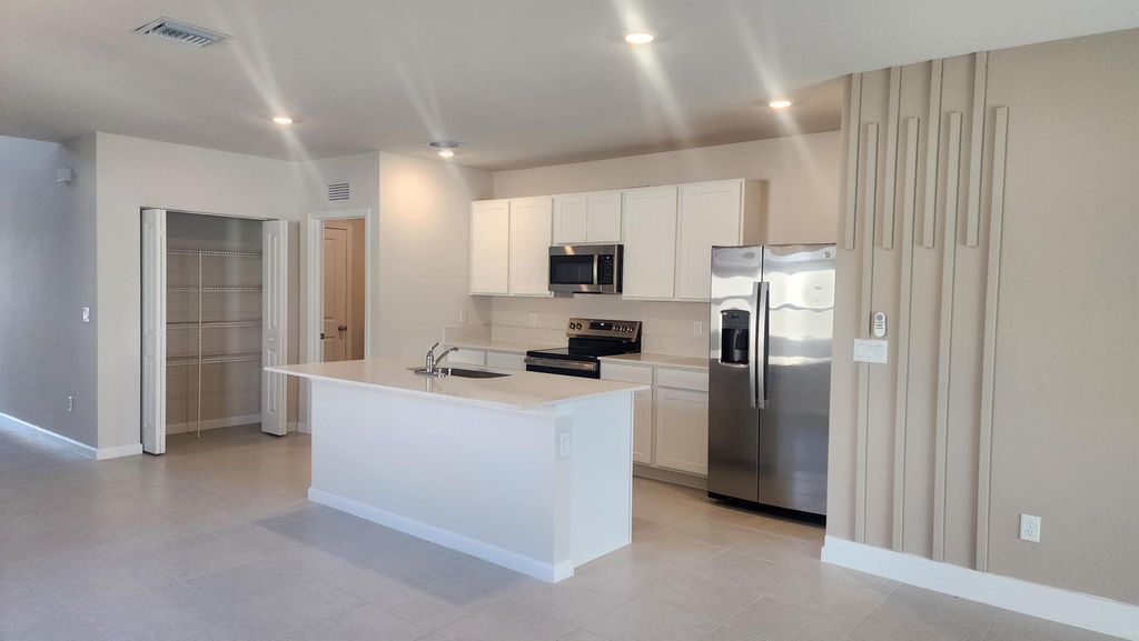 Photo of 799 Carlyle Way, Fort Pierce, FL 34947 (MLS # R11148647)