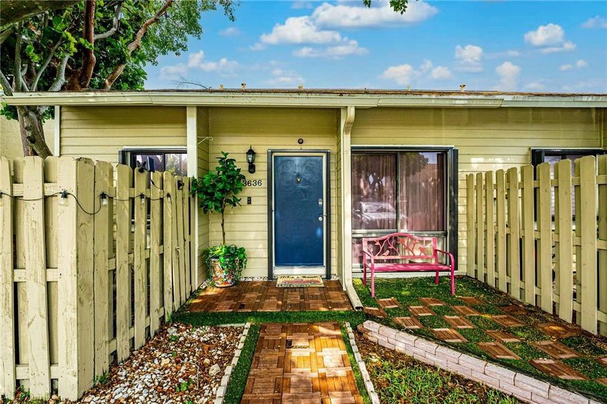 Welcome Home to this spacious, corner unit townhome with a large, private backyard which is an entertainers dream!  This townhome boasts 3 bedrooms and 2 full bathrooms PLUS a small loft space. The primary bedroom suite is located upstairs and includes a spacious sitting area. The sitting area can be used as office space, a nursery or private den.  There are 2 large secondary bedrooms are located downstairs.  The kitchen and bathrooms have been updated.  The kitchen offers granite countertops and stainless steel appliances. This townhome offers complete hurricane protection.  Schedule your private showing today!