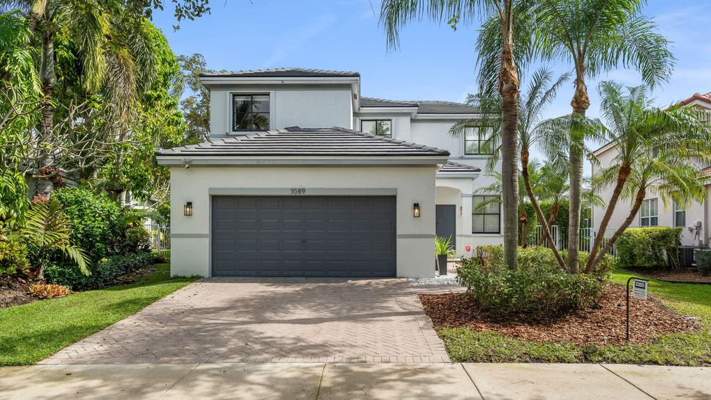 Photo of 1089 Tupelo Way, Weston, FL 33327 (MLS # B26009903)