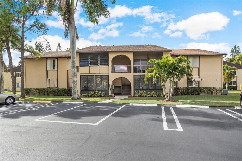 Photo of 311 Pine Ridge Circle Cir #B-1, Green Acres, FL 33463 (MLS # R10765450)