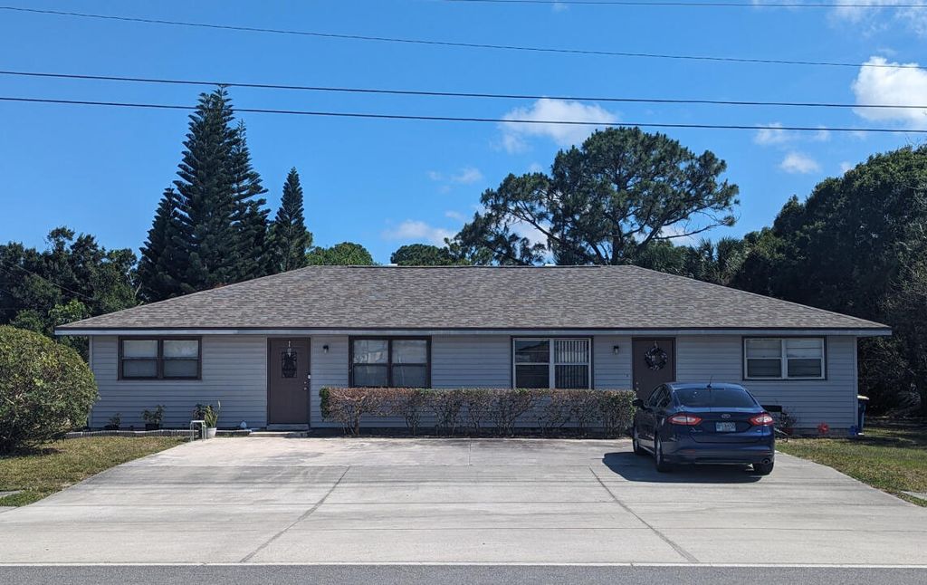 Photo of 809 E Weatherbee Road, Fort Pierce, FL 34982 (MLS # R10984746)