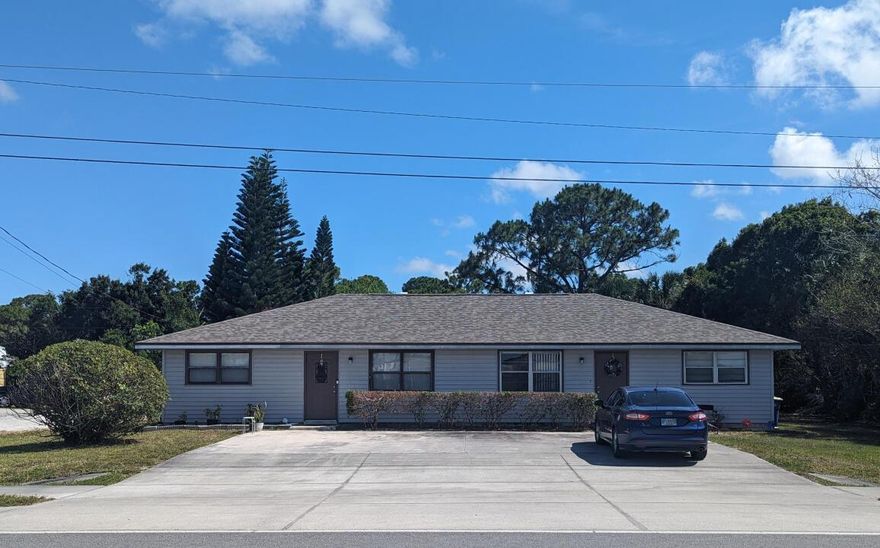 WELL KEPT DUPLEX WITH BRAND NEW ROOF LOCATED ON BEAUTIFUL HALF ACRE!! Grab it before it's gone!! Located east of US1 in a very safe area directly across from Gator Trace Golf community and Weatherbee Elementary School. 1830 total square feet. 915sq.ft. per side. Each unit comes with 2 bedrooms, closets, 1 bath, kitchen/dining area, separate laundry room, and large shared walk-in closet for additional storage.  Property being sold ''as is''.