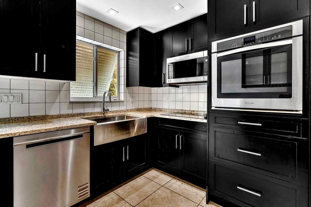 Photo of 318 NE 1st Avenue, Delray Beach, FL 33444 (MLS # R11096210)