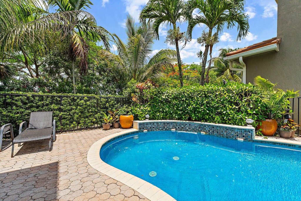 Photo of 9389 Osprey Isles Boulevard, Palm Beach Gardens, FL 33412 (MLS # R11102387)