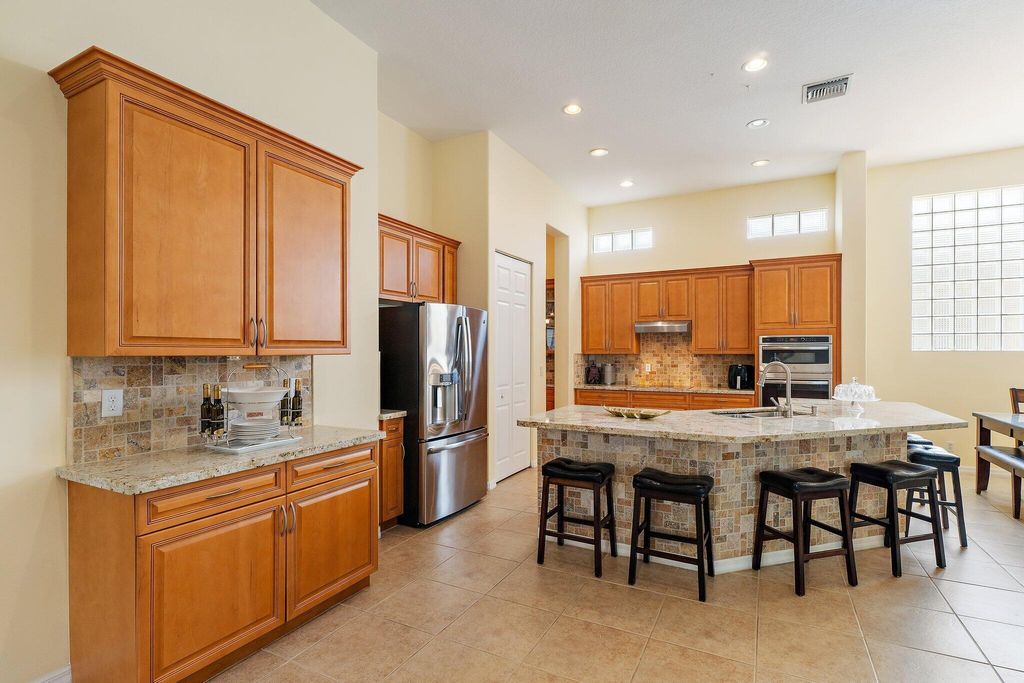 Photo of 9389 Osprey Isles Boulevard, Palm Beach Gardens, FL 33412 (MLS # R11102387)