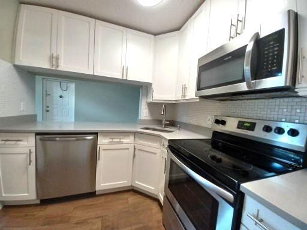 Photo of 806 Sky Pine Way #B3, Greenacres, FL 33415 (MLS # F10533957)