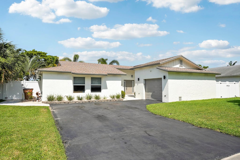 Photo of 275 NW 37th Way, Deerfield Beach, FL 33442 (MLS # B26072764)
