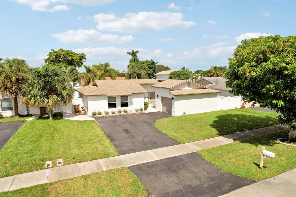 Photo of 275 NW 37th Way, Deerfield Beach, FL 33442 (MLS # B26072764)