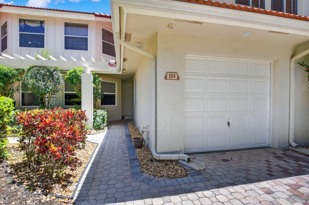 Photo of 2584 Coco Plum Blvd #104, Boca Raton, FL 33496 (MLS # B26093138)