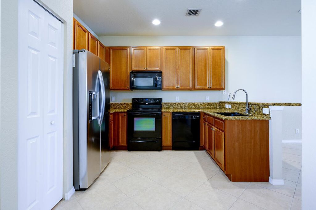 Photo of 105 Black Ironwood Road #105, Jupiter, FL 33458 (MLS # R11063543)