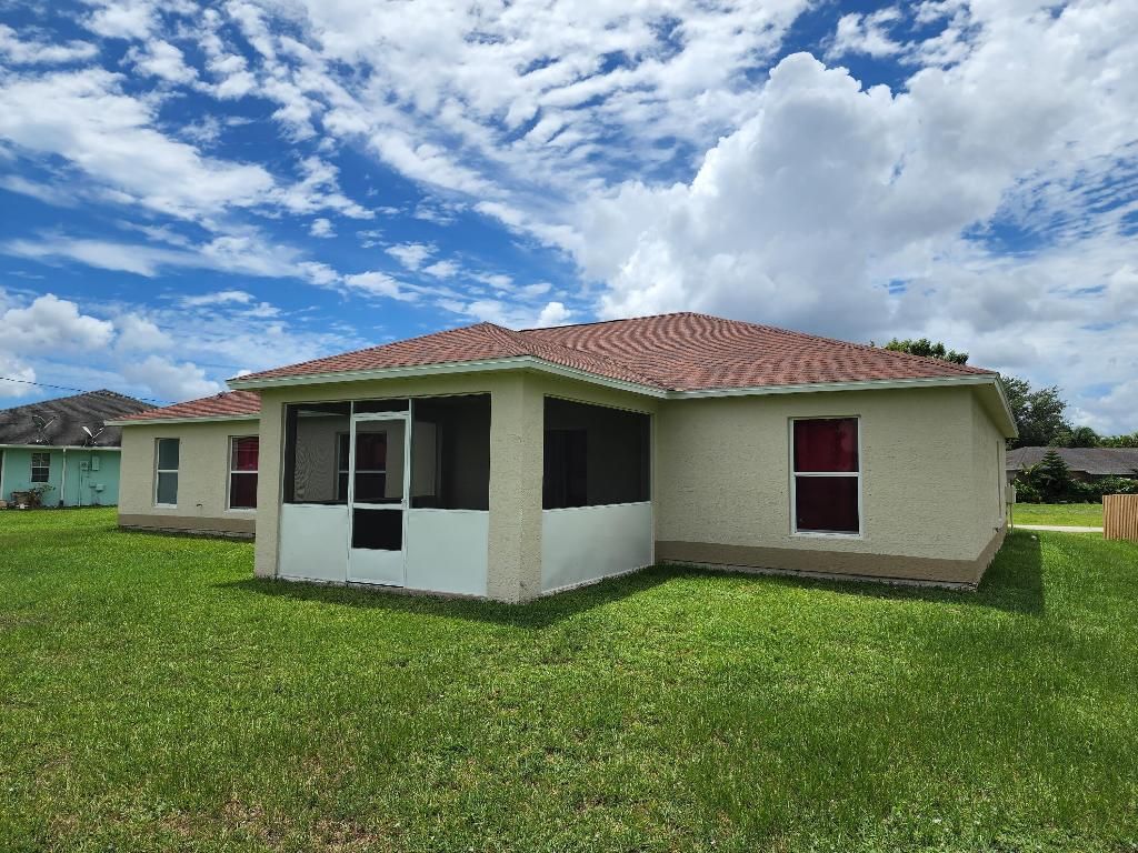 Photo of 2709 SW Somber Road, Port Saint Lucie, FL 34953 (MLS # R10924518)