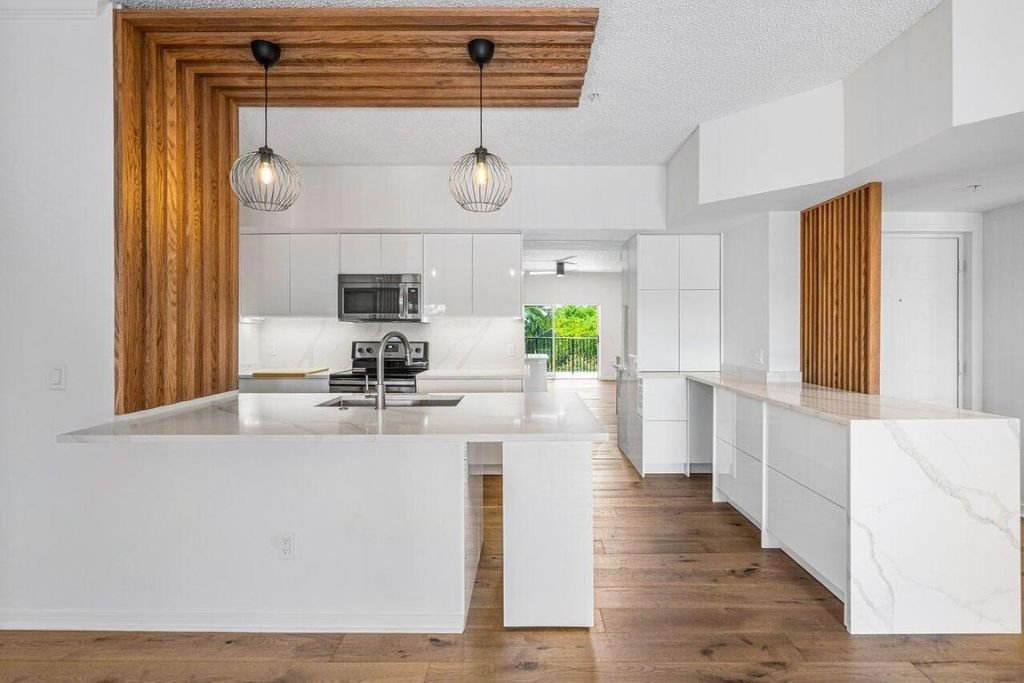 Photo of 2411 Tuscany Way #2-411, Boynton Beach, FL 33435 (MLS # R11125900)