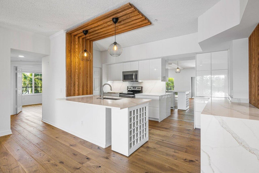 Photo of 2411 Tuscany Way #2-411, Boynton Beach, FL 33435 (MLS # R11125900)