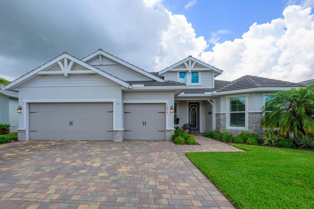 Photo of 12617 SW Cattleya Lane, Port Saint Lucie, FL 34987 (MLS # R11099176)
