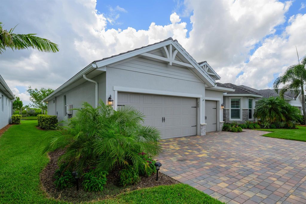 Photo of 12617 SW Cattleya Lane, Port Saint Lucie, FL 34987 (MLS # R11099176)