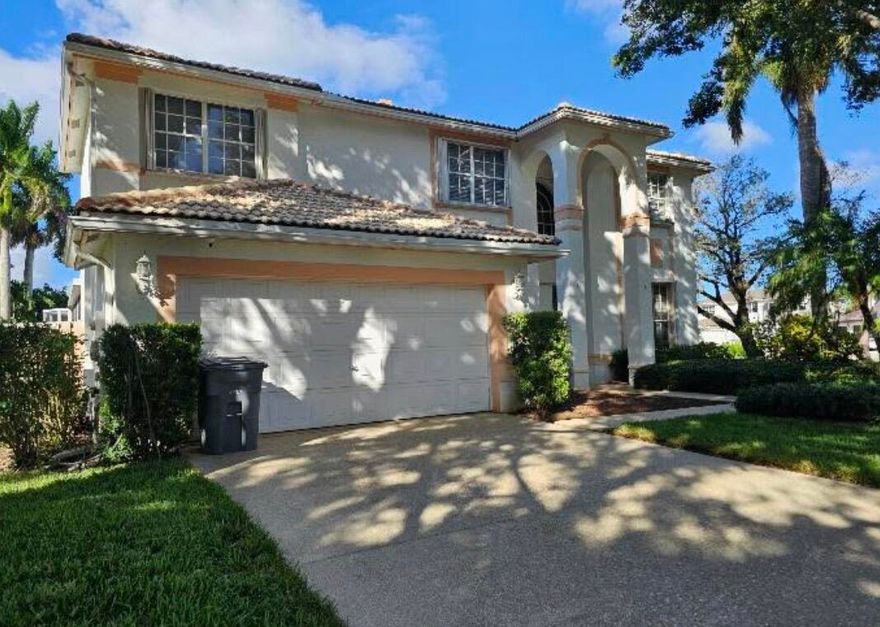 Welcome to this beautifully maintained 4-bedroom, 2.5-bath home tucked away on a quiet cul-de-sac in desirable Palm Beach County. Offering a 2-car garage and abundant driveway parking, this home combines comfort, function, and extensive upgrades throughout. The first floor features elegant tile flooring, creating a clean and cohesive look, while the second level and staircase showcase newly installed solid wood flooring. Crown molding accents the lower level and primary bedroom, complemented by upgraded 6-inch baseboards and modern knockdown ceilings (no popcorn).The completely renovated kitchen boasts brand-new stainless steel appliances and contemporary finishes, making it the heart of the home. All bathrooms have been beautifully remodeled, including a luxurious primary suite.
