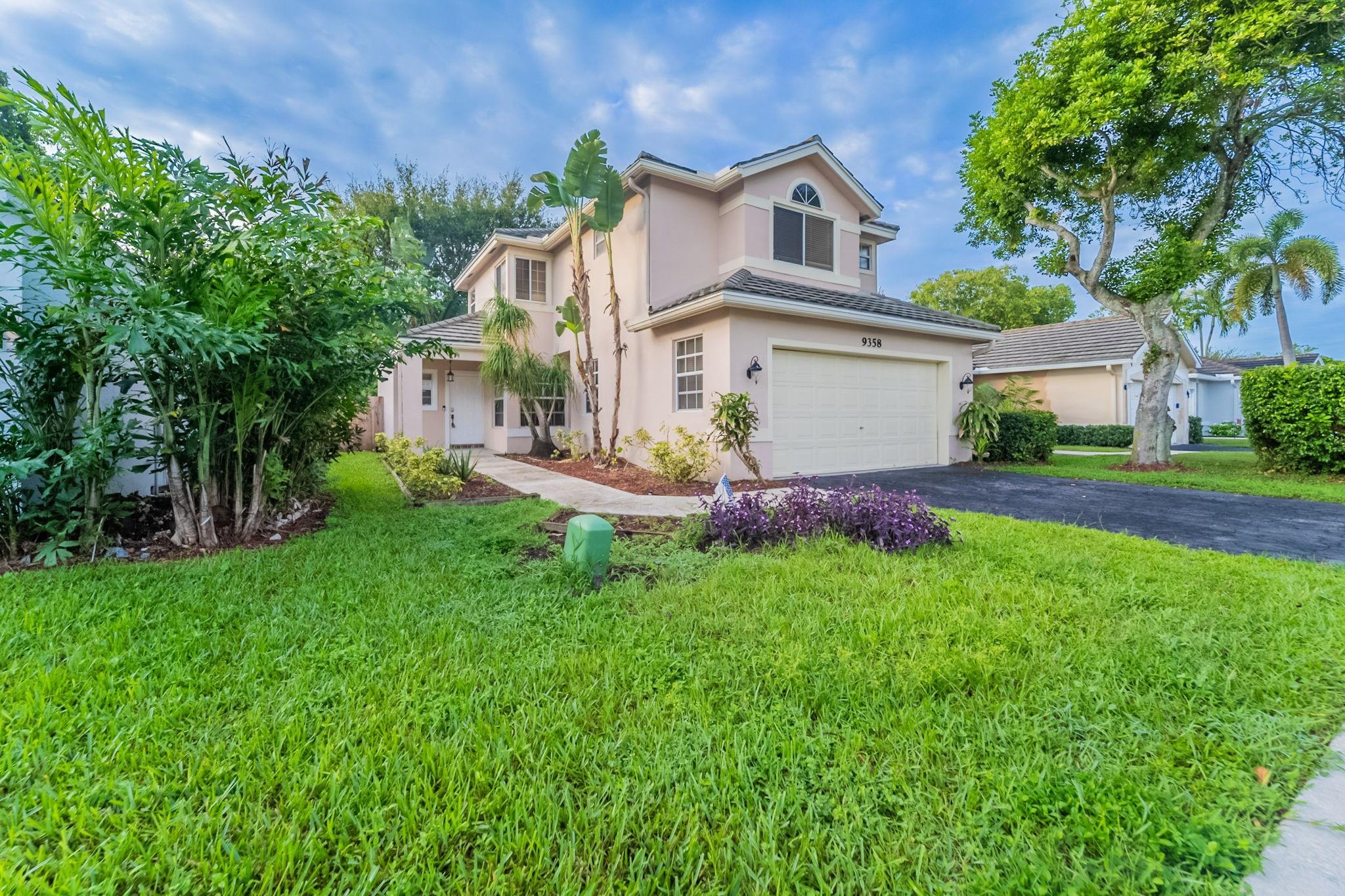 This beautiful two-story home offers 3 bedrooms and 2.5 bathrooms with a 2-car garage. The kitchen features a convenient bar and a breakfast area with a bay window, perfect for casual dining. French doors from the living area open up to a fenced backyard, while the enclosed back lanai provides additional space for relaxing or entertaining. Schedule a showing today!