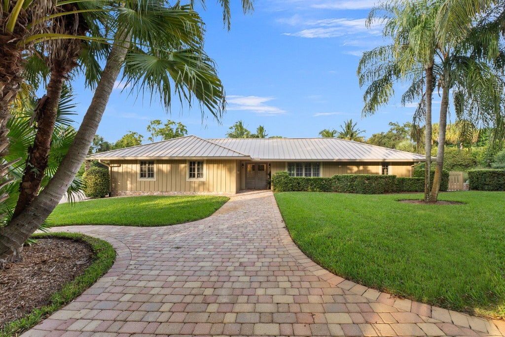 Photo of 875 NE Stokes Terrace, Jensen Beach, FL 34957 (MLS # R11028208)