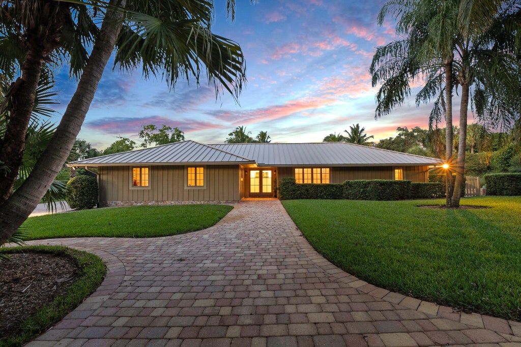 Photo of 875 NE Stokes Terrace, Jensen Beach, FL 34957 (MLS # R11028208)