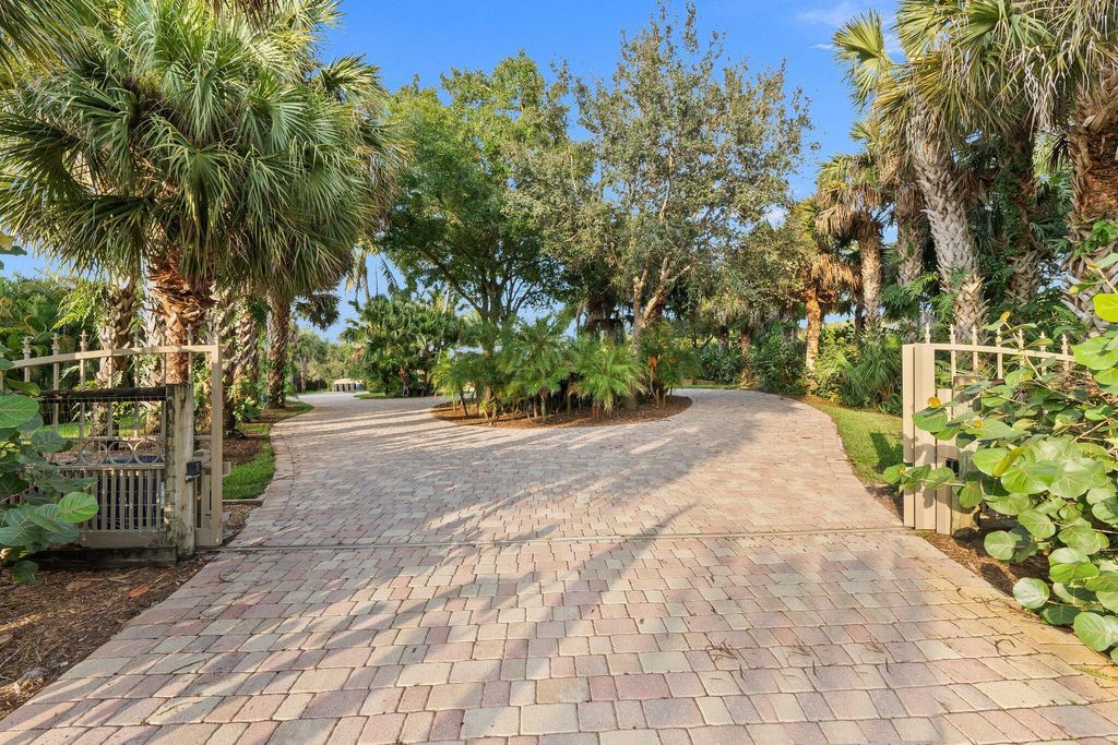 Photo of 875 NE Stokes Terrace, Jensen Beach, FL 34957 (MLS # R11028208)