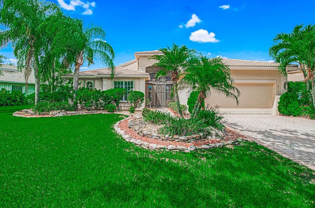Photo of 8710 Tierra Lago Cove, Lake Worth, FL 33467 (MLS # R11003615)