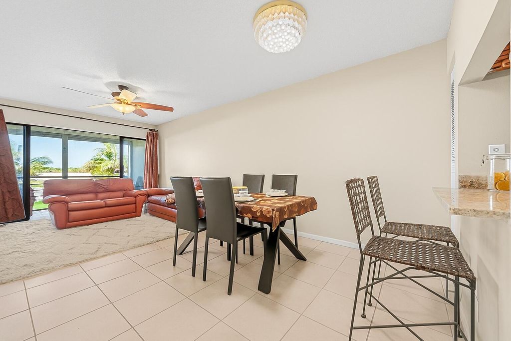 Photo of 1901 W Woolbright Road #A202, Boynton Beach, FL 33426 (MLS # R11116951)