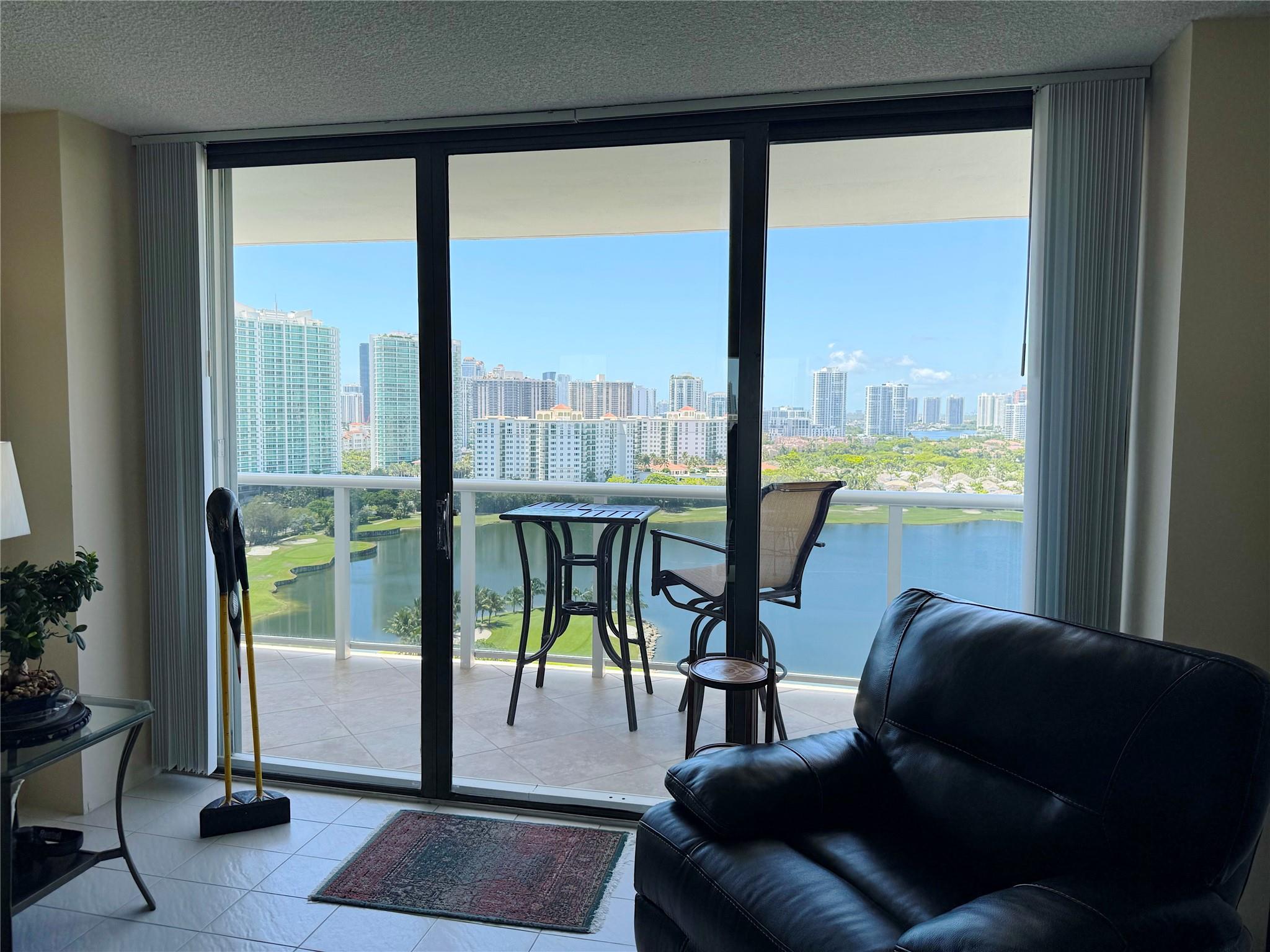 Enjoy breathtaking panoramic views of the Turnberry Golf Course, tranquil lakes, and a peek of the ocean from this impeccably maintained 1-bedroom, 1.5-bath condo on the 20th floor of high-rise. This south-facing unit boasts abundant natural light and a spacious balcony perfect for relaxing or entertaining. Unit boasts a private primary bath, and separate guest powder room. Includes covered deeded parking in adjacent garage. Prime location near Aventura Mall, Turnberry Country Club, Don Soffer Exercise Trail, restaurants, and shops. Building offers a fitness center, sauna, card room, community room with kitchen, and 24-hour security. Pool and BBQ area currently under renovation.
Don’t miss this rare opportunity to own a slice of paradise in one of Aventura’s most desirable communities!